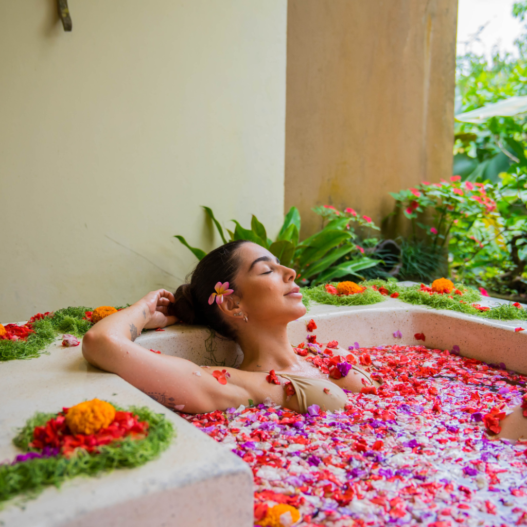 Guest enjoying a signature flower bath at Dewi Gangga Spa, one of the best spas in Ubud